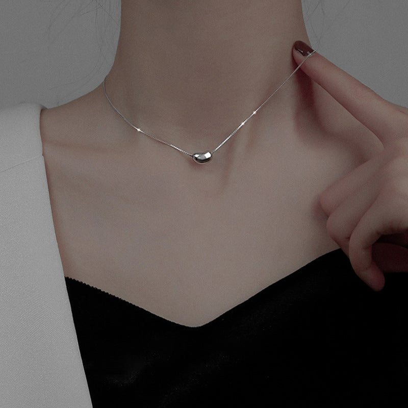Collar con colgante de alubia FP