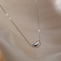 Collar con colgante de alubia FP